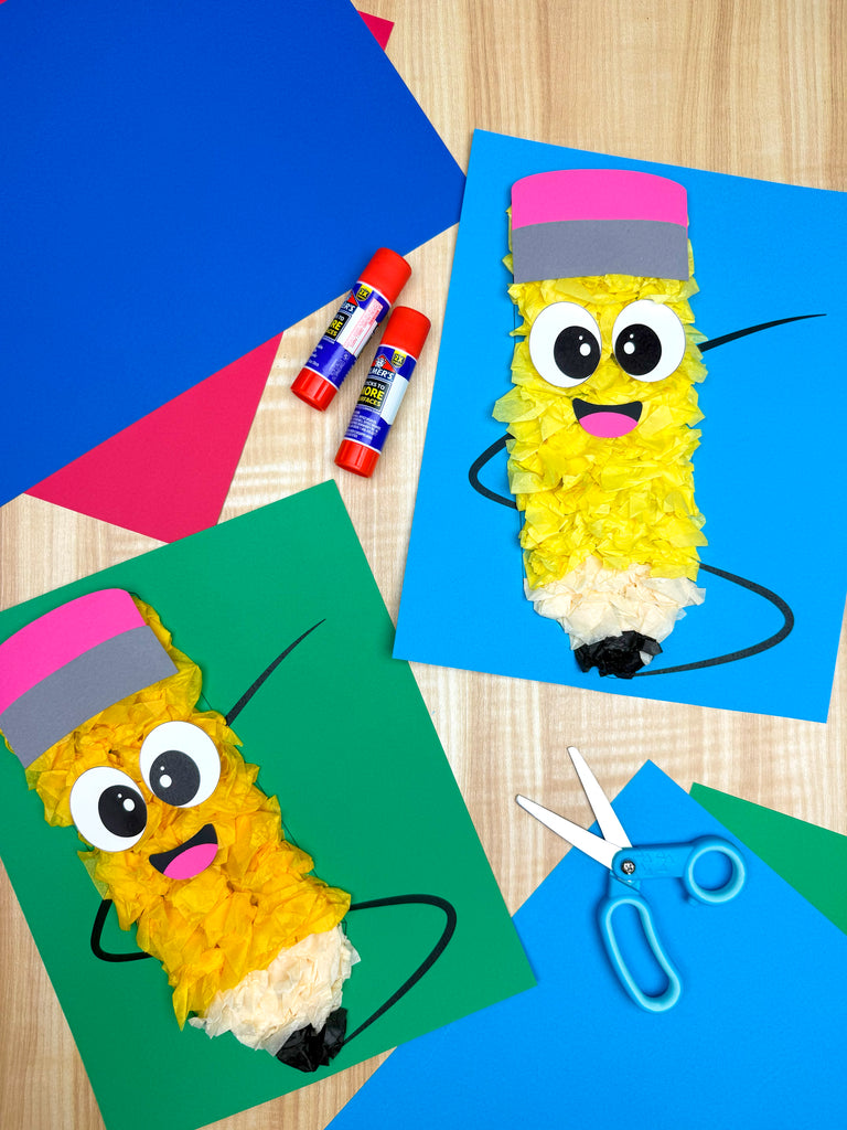 Craft project with colorful paper and pencil tissue paper craft on a wooden surface