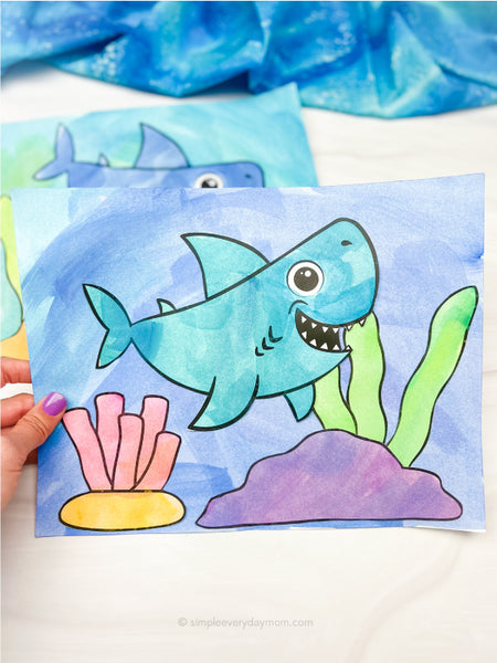hand holding shark art project