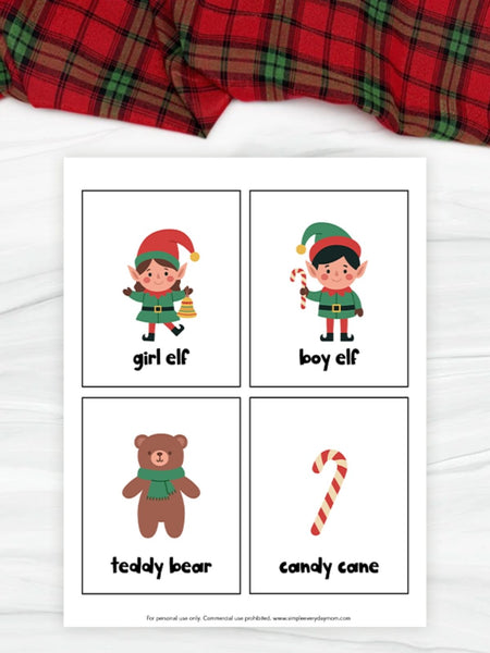 Set of Christmas-themed flashcards with elves, a teddy bear, and candy cane on a white background.