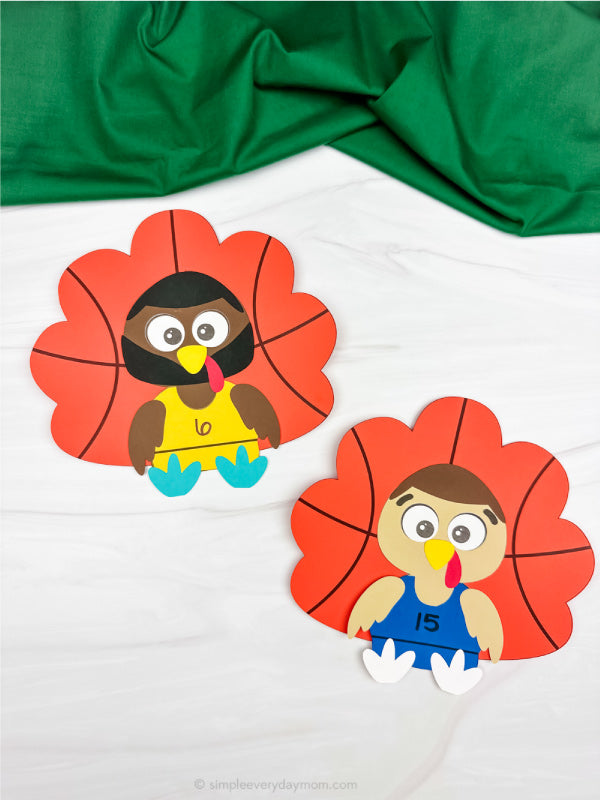 Two turkeys disguised as basketball players with a green and white background. 