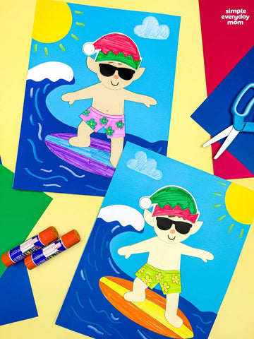 Two elf surfing crafts on colorful background with glue sticks and scissors