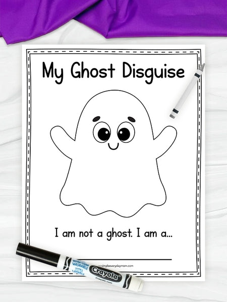 A "my ghost disguise" worksheet on marble background with purple fabric on top. 