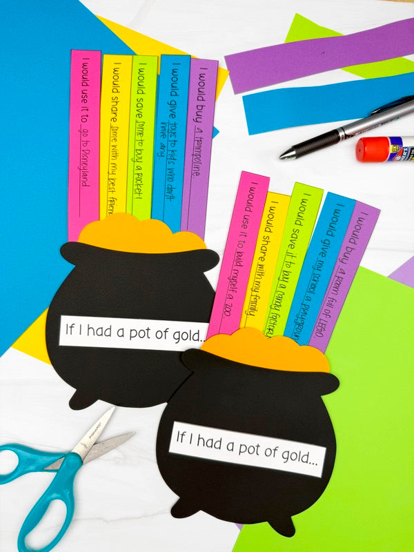two pot of gold writing crafts with craft supplies in the background