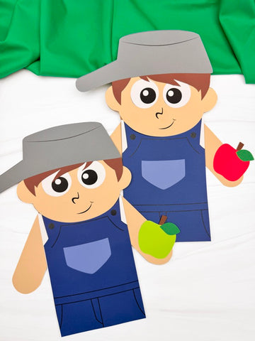 Two Johnny Appleseed puppet crafts wearing blue overalls and pot hats, holding green and red apples.