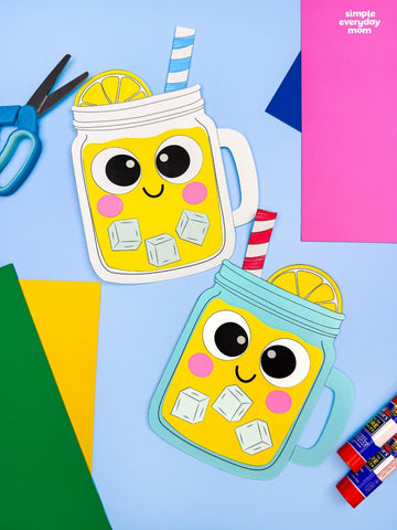Two lemonade paper crafts for kids on colorful background with glue sticks and scissors 