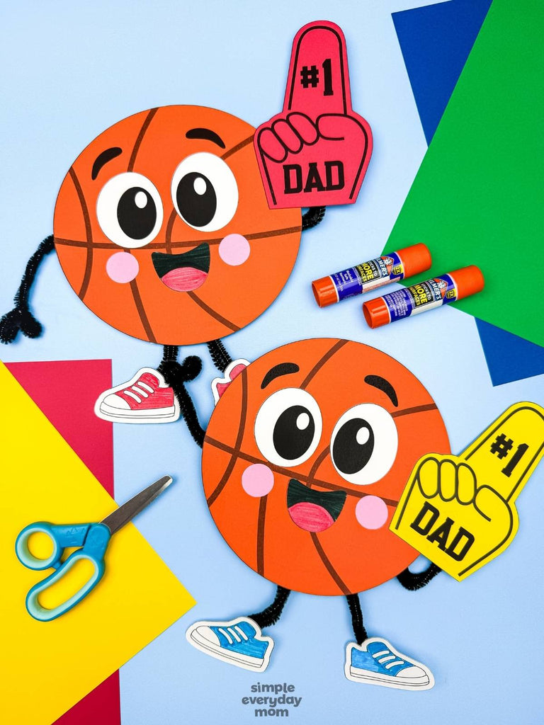 Two cartoon basketball crafts for kids on a colorful background with scissors and glue sticks. 