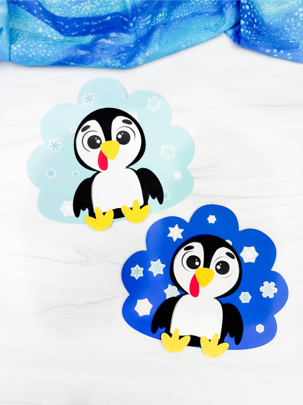 Two turkeys disguised as penguins on a white background with blue decorative elements.