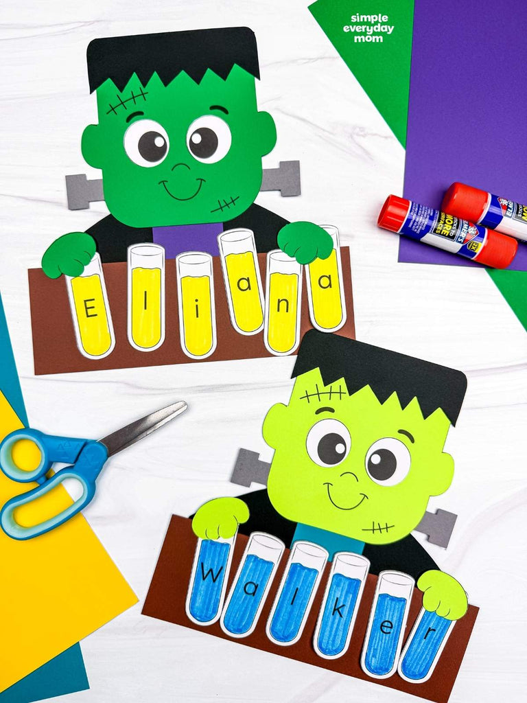 Two Frankenstein monster name crafts on white background with colored paper, scissors, and glue. 