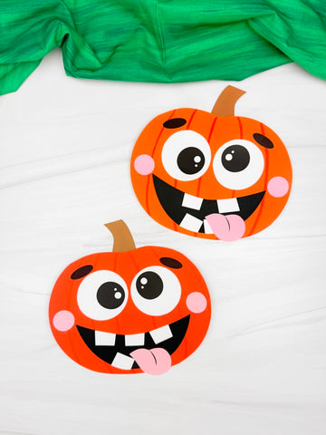 Two paper pumpkins crafts with cartoon faces on a white background