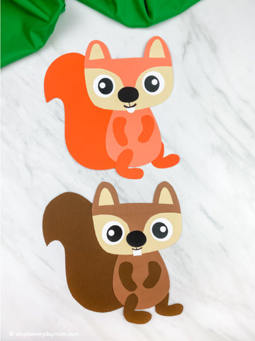 Two squirrel paper crafts on a white background