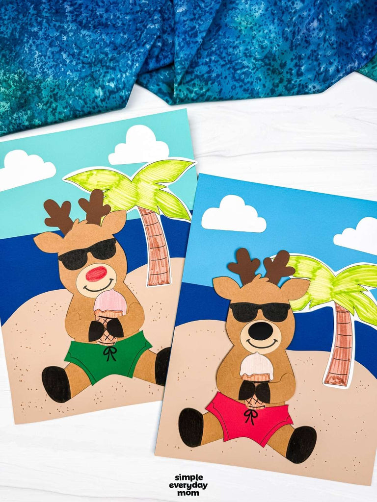 Two reindeer beach crafts for kids on white background with blue fabric on top