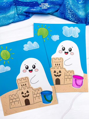 Two ghost at the beach crafts on white background with blue fabric on top