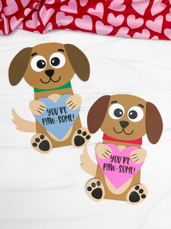 Two cartoon dogs holding hearts with 'You're Paw-some!' text on a white background.
